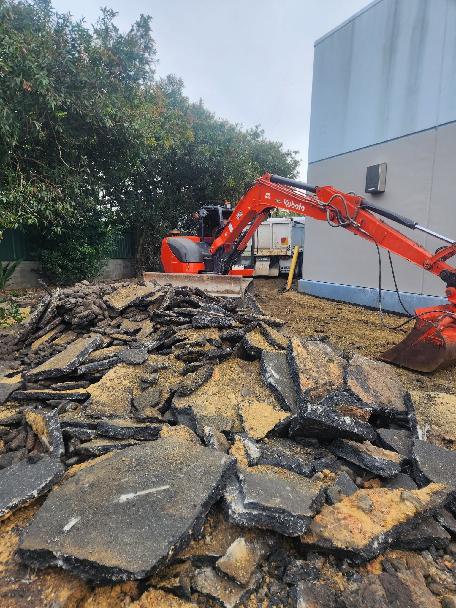 Old asphalt driveway excavation and removal
